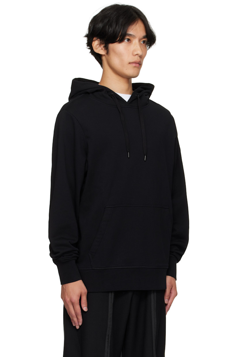 Cotton French terry hoodie.

· Drawstring at hood
· Kangaroo pocket at waist
· Rib-knit hem and cuffs
· Embroidered logo patch at sleeve

Supplier color: Black