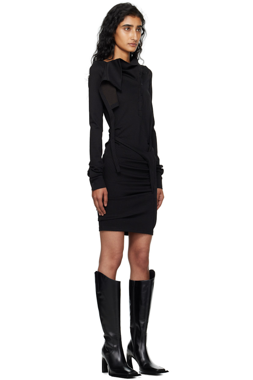 Stretch jersey minidress.

· Pinstripes throughout
· Asymmetric neck
· Offset four-button placket
· Extended trim at front
· Pleats at side seams
· Buttoned barrel cuffs

Supplier color: Black pinstripe