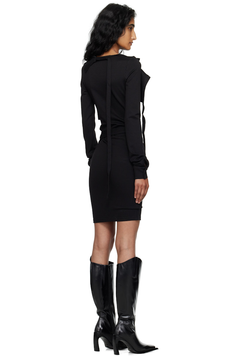 Stretch jersey minidress.

· Pinstripes throughout
· Asymmetric neck
· Offset four-button placket
· Extended trim at front
· Pleats at side seams
· Buttoned barrel cuffs

Supplier color: Black pinstripe