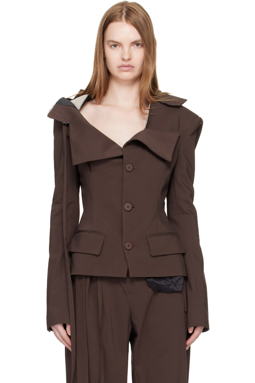 Plain-woven stretch cotton-blend blazer.

· Asymmetrical off-the-shoulder construction
· Raw edges throughout 
· Modified notched lapel
· Button closure
· Welt pocket at chest
· Flap pockets at waist
· Padded shoulders
· Vented cuffs
· Twin vents at back hem
· Welt pocket at interior 
· Full satin lining 

Supplier color: Dark brown