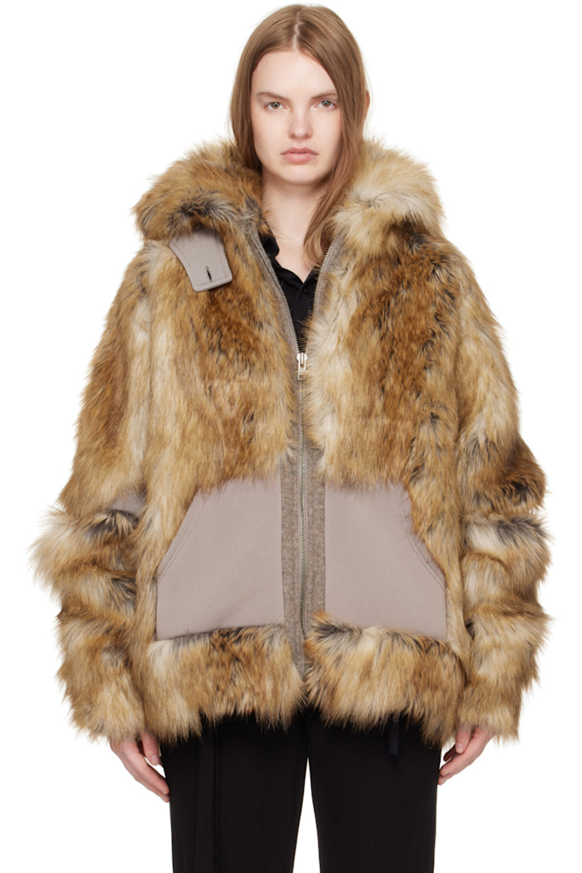 Faux-fur and bonded jersey jacket. 

· Paneled construction 
· Detachable throat guard at spread collar 
· Zip closure
· Patch pockets at front 
· Dropped shoulders
· Full satin twill lining 

Supplier color: Orange/Grey furry