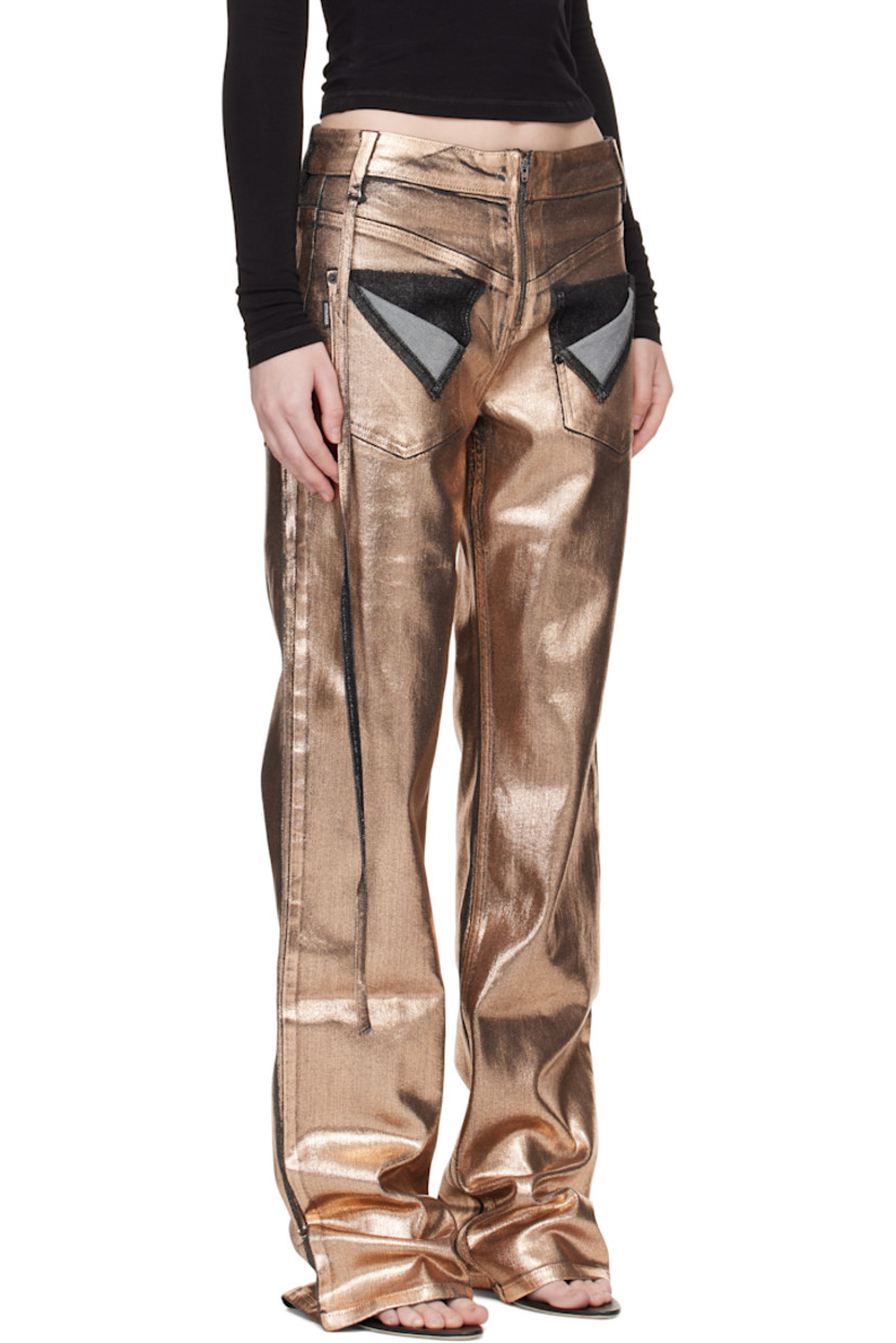 Coated non-stretch denim jeans. 

· Belt loops
· Four-pocket styling
· Zip closure
· Strap at outseam
· Logo patch at back waistband

Supplier color: Black/Bronze paint
