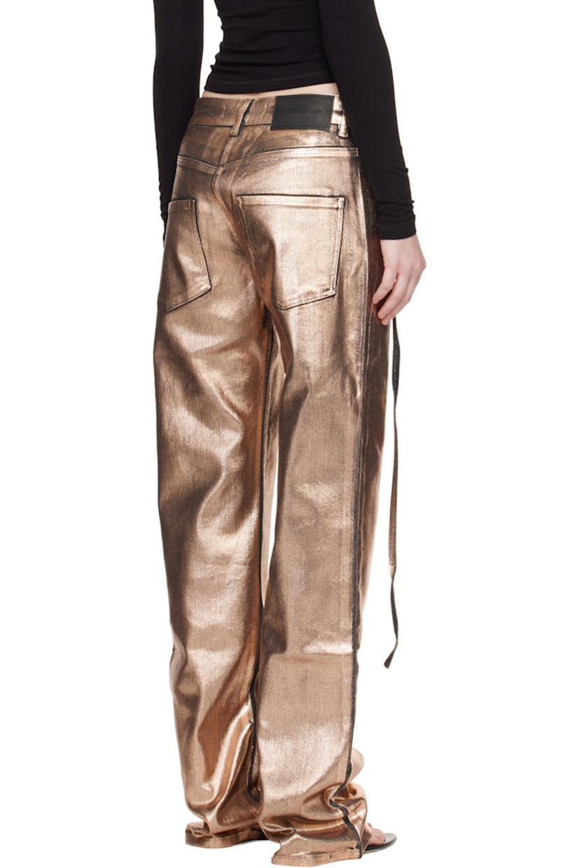 Coated non-stretch denim jeans. 

· Belt loops
· Four-pocket styling
· Zip closure
· Strap at outseam
· Logo patch at back waistband

Supplier color: Black/Bronze paint
