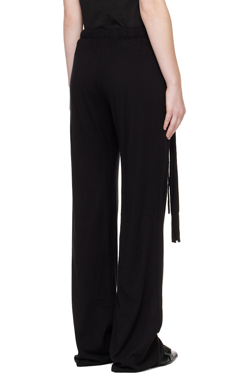 Knit viscose-blend lounge pants. 

· Elasticized waistband
· Two-pocket styling
· Self-tie straps and logo plaque at waistband

Supplier color: Black