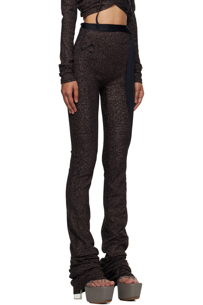 Rib-knit stretch cotton-blend lounge pants.

· Metallic thread detailing throughout
· Jersey trim at elasticized waistband and outseam
· Logo embroidered at front

Supplier color: Black/Bronze glitter