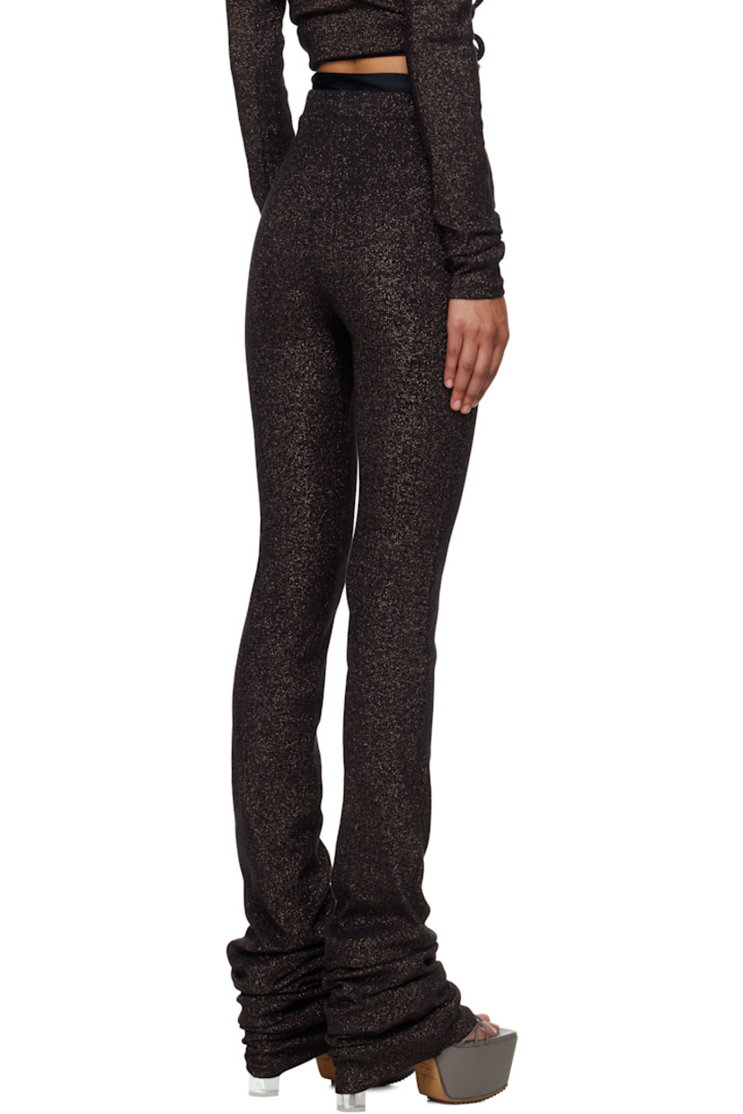 Rib-knit stretch cotton-blend lounge pants.

· Metallic thread detailing throughout
· Jersey trim at elasticized waistband and outseam
· Logo embroidered at front

Supplier color: Black/Bronze glitter