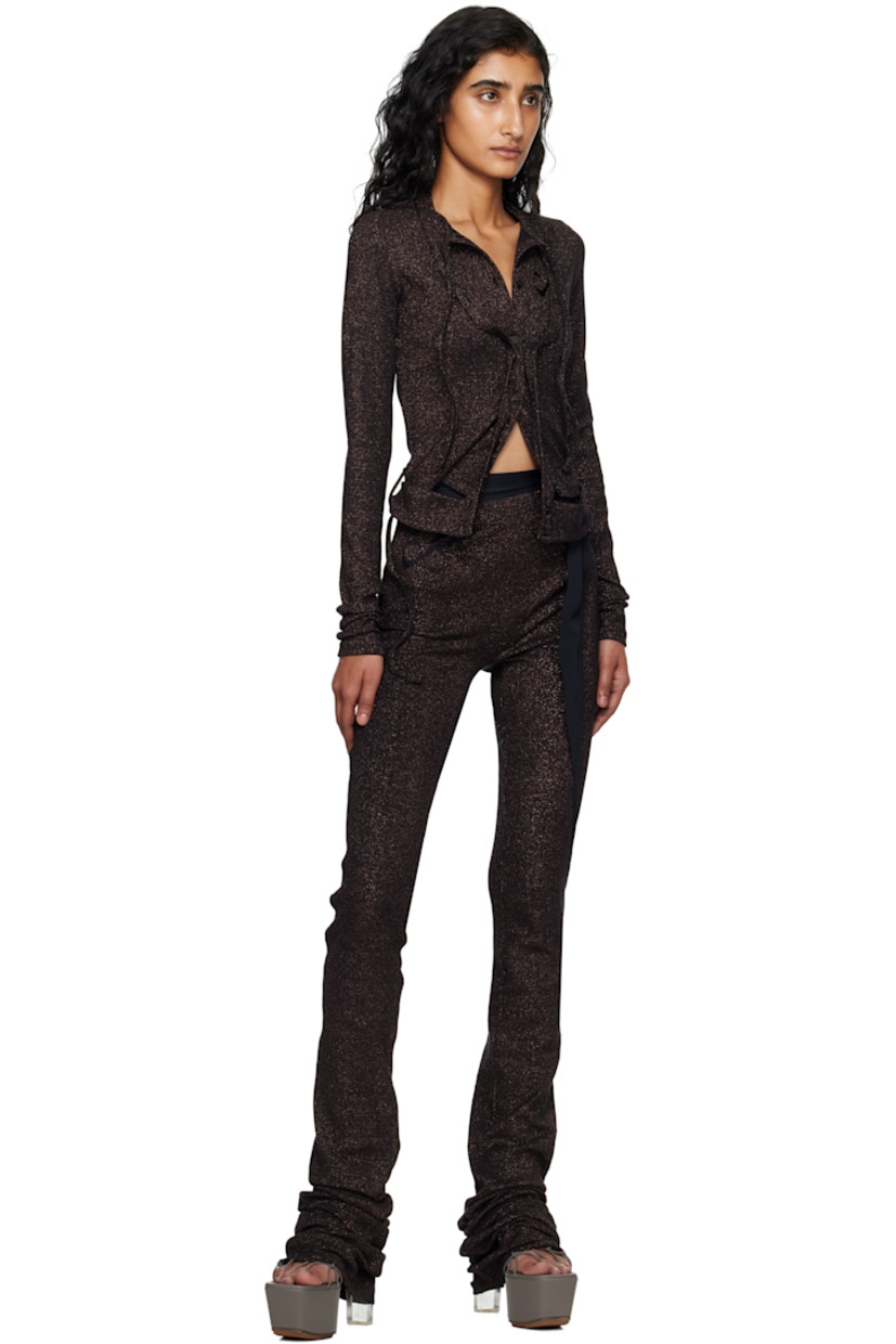 Rib-knit stretch cotton-blend lounge pants.

· Metallic thread detailing throughout
· Jersey trim at elasticized waistband and outseam
· Logo embroidered at front

Supplier color: Black/Bronze glitter