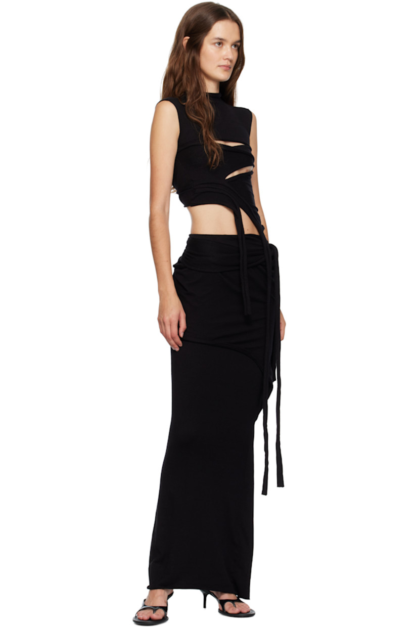 Knit viscose-blend maxi skirt.

· Raw edges throughout
· Draped and asymmetrical construction
· Extended trim at side seams
· Gathering at back

Supplier color: Black