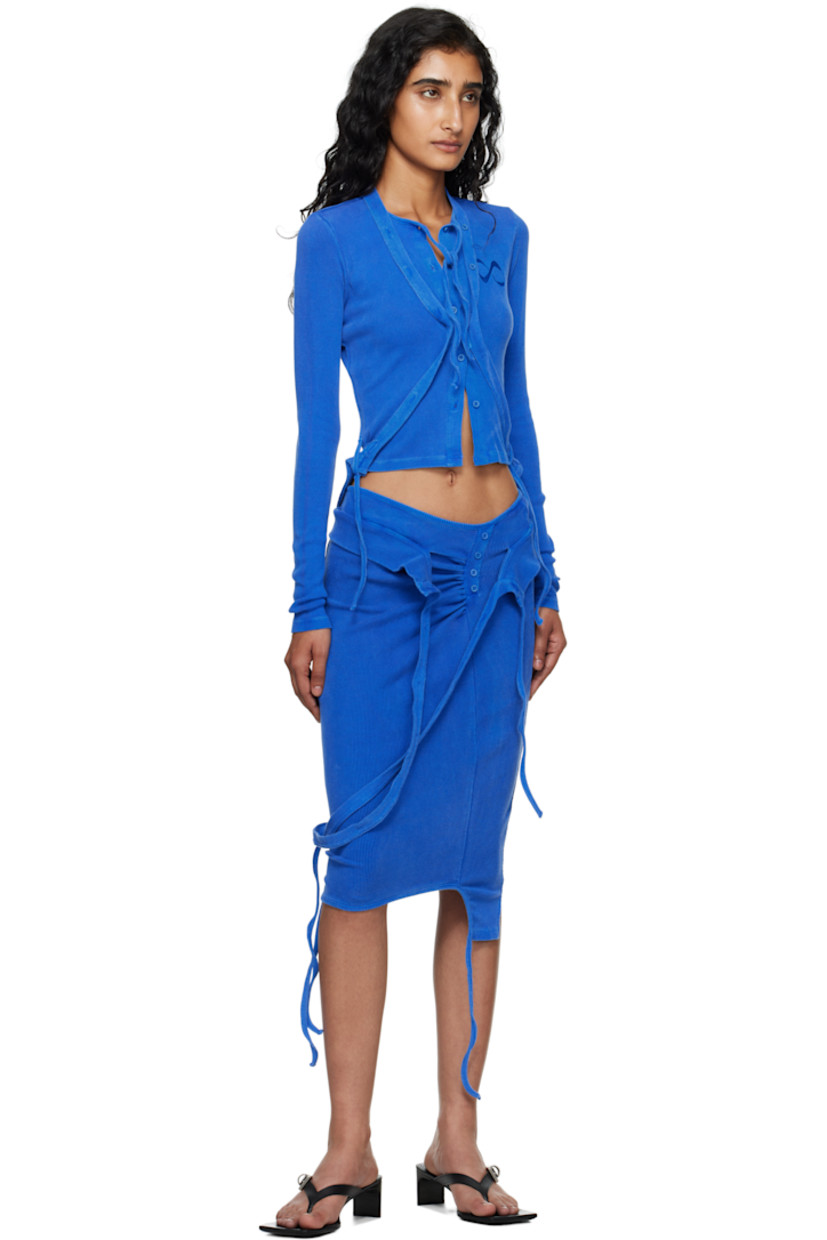 Rib-knit stretch organic cotton cardigan.

· Self-tie fastening and cutouts at crewneck and hem
· Button closure
· Logo embroidered at chest

Supplier color: Blue