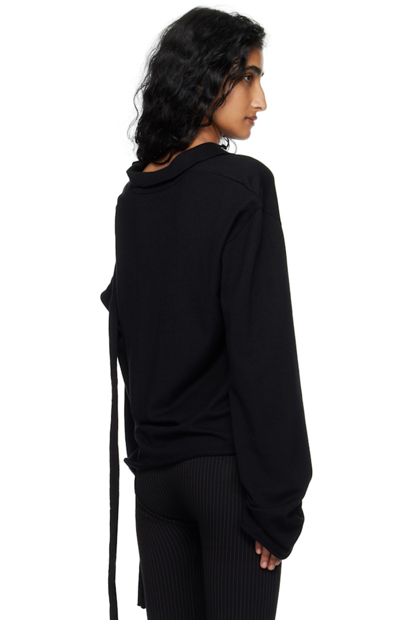 Knit viscose-blend polo.

· Logo plaque at spread collar
· Three-button placket
· Rolled edge at hem and cuffs
· Extended trim at hem and sleeve
· Dropped shoulders

Supplier color: Black