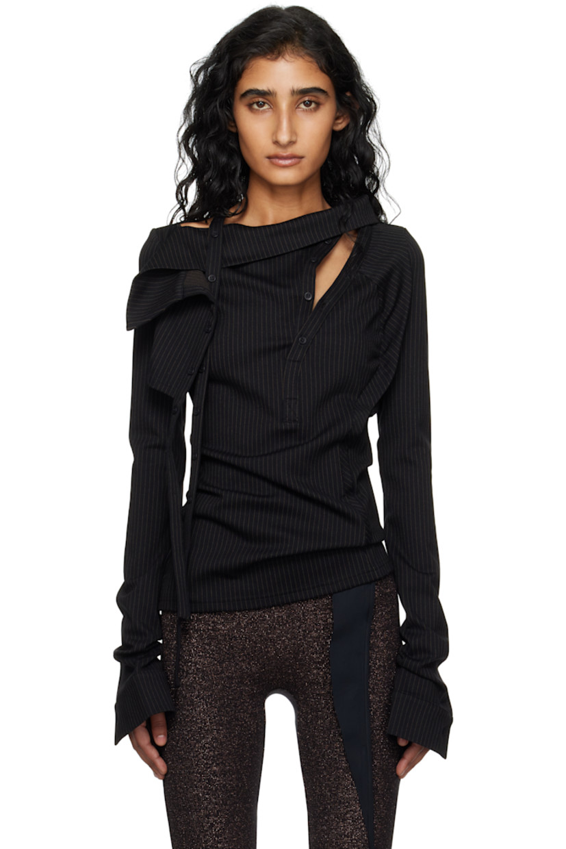 Stretch jersey blouse.

· Pinstripes throughout
· Asymmetrical neck
· Offset four-button placket
· Extended trim at front
· Pleats at side seams
· Buttoned barrel cuffs

Supplier color: Black pinstripe