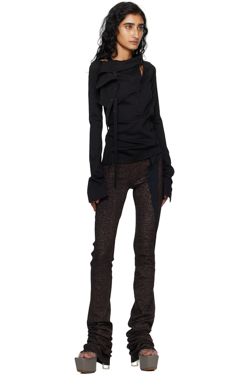 Stretch jersey blouse.

· Pinstripes throughout
· Asymmetrical neck
· Offset four-button placket
· Extended trim at front
· Pleats at side seams
· Buttoned barrel cuffs

Supplier color: Black pinstripe