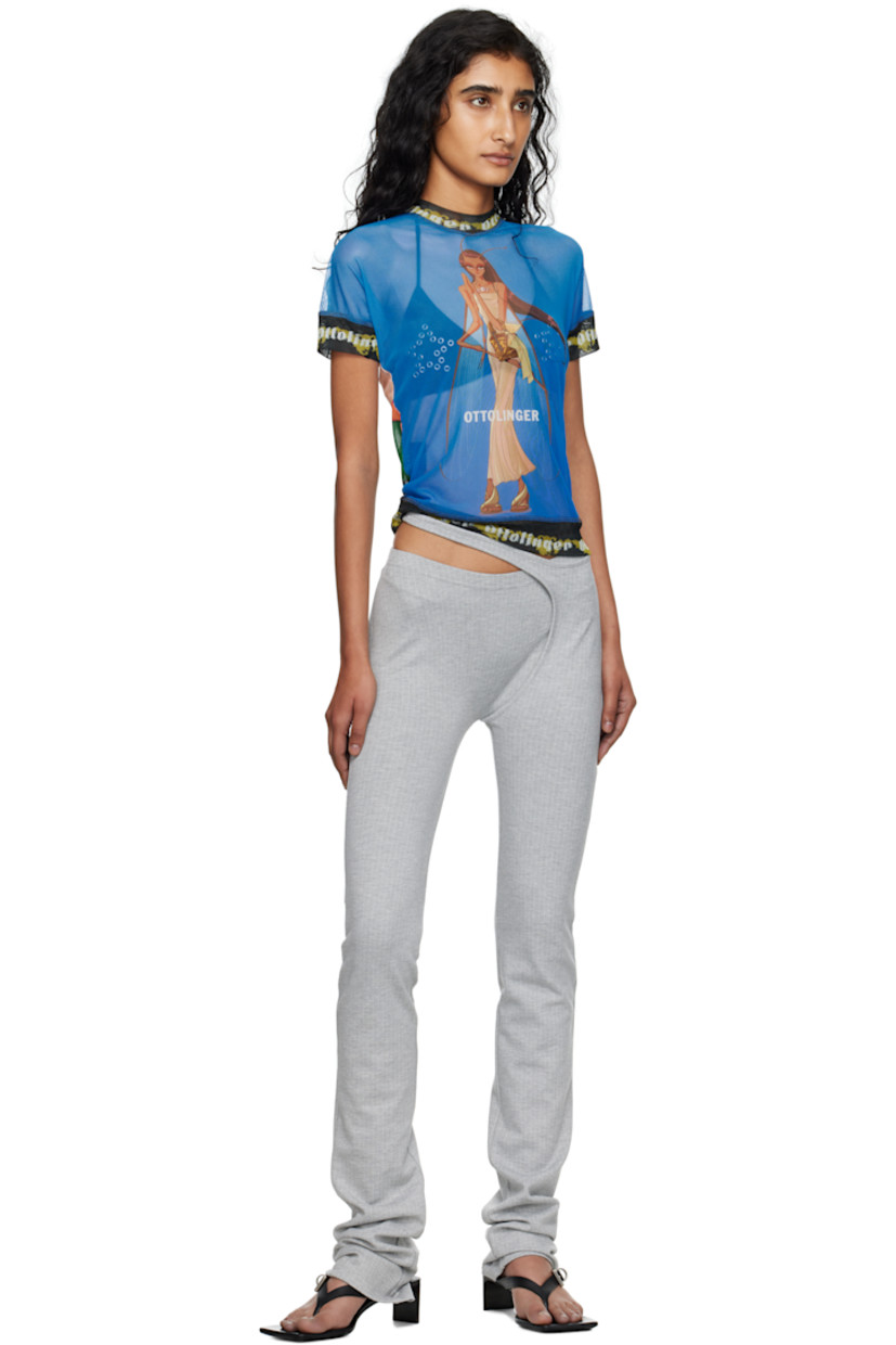 Sheer stretch recycled mesh T-shirt.

· Logo printed throughout
· Mock neck
· Graphic printed at front and back

Featuring artwork from Julien Ceccaldi.

Supplier color: Julien Ceccaldi