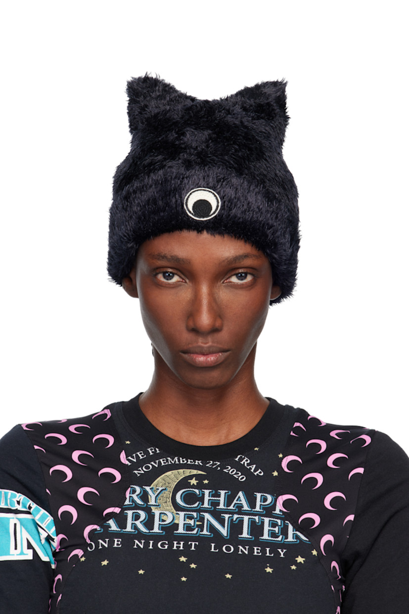 Shag-knit nylon beanie.

· Ear appliqués at crown
· Embroidered logo patch at rolled brim

Supplier color: Black