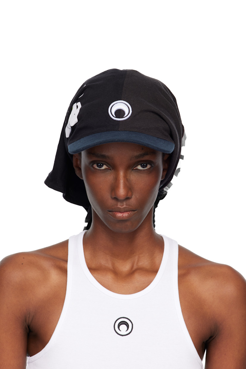 Upcycled jersey cap.

· Graphics and text printed throughout
· Bandana-style construction
· Logo embroidered at face
· Curved brim
· Cinch fastening

Each item is unique. Please note that graphics may vary.

Supplier color: Black