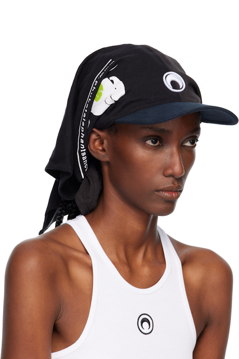 Upcycled jersey cap.

· Graphics and text printed throughout
· Bandana-style construction
· Logo embroidered at face
· Curved brim
· Cinch fastening

Each item is unique. Please note that graphics may vary.

Supplier color: Black