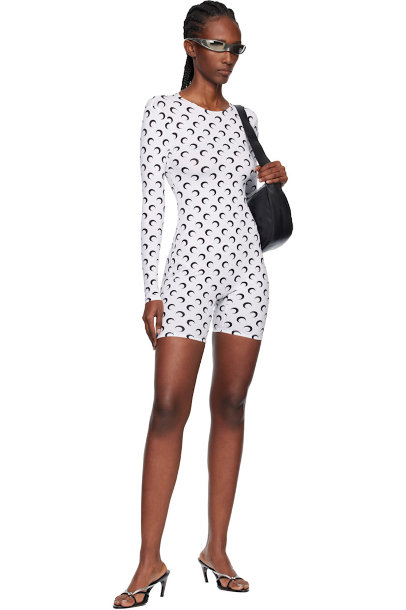 Stretch recycled nylon jersey jumpsuit.

· Logo pattern printed throughout
· Crewneck
· Zip closure at back

Supplier color: Moon black on white
