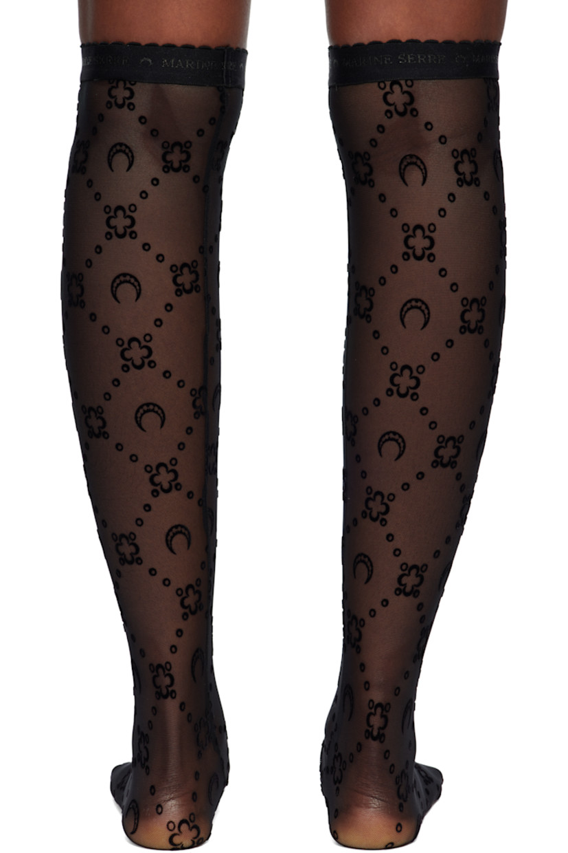 Pair of knee-high sheer stretch recycled nylon mesh socks.

· Logo pattern flocked throughout
· Scalloped edge at logo-woven elasticized cuffs
· Logo flag at cuff

Supplier color: Moonogram black