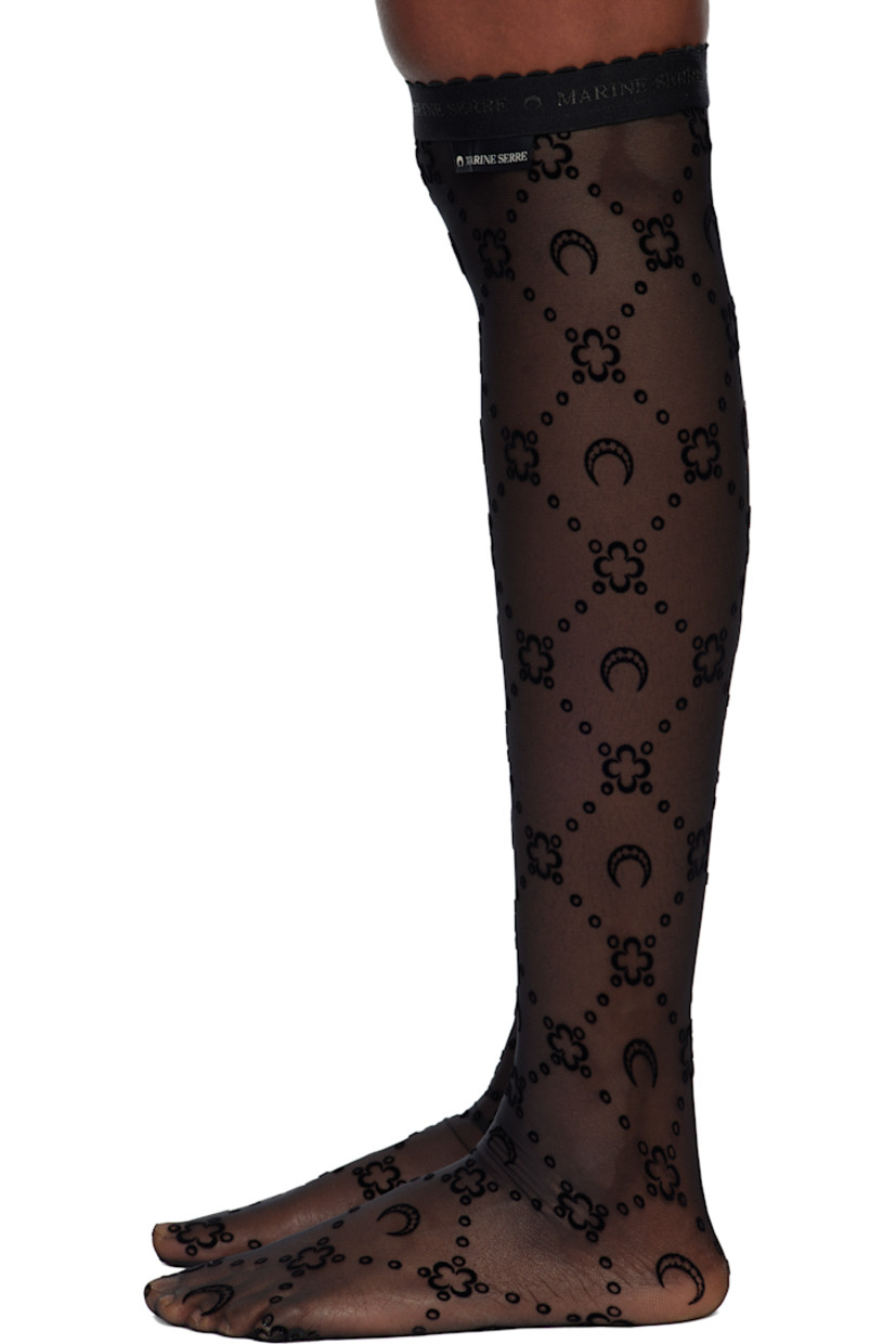 Pair of knee-high sheer stretch recycled nylon mesh socks.

· Logo pattern flocked throughout
· Scalloped edge at logo-woven elasticized cuffs
· Logo flag at cuff

Supplier color: Moonogram black