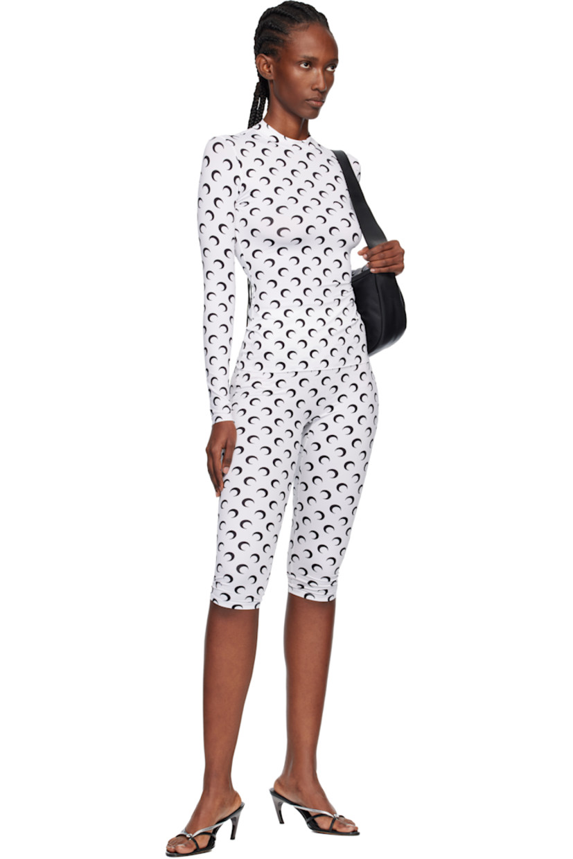 Stretch recycled nylon jersey leggings.

· Logo pattern printed throughout
· Logo-woven elasticized waistband

Supplier color: Moon black on white