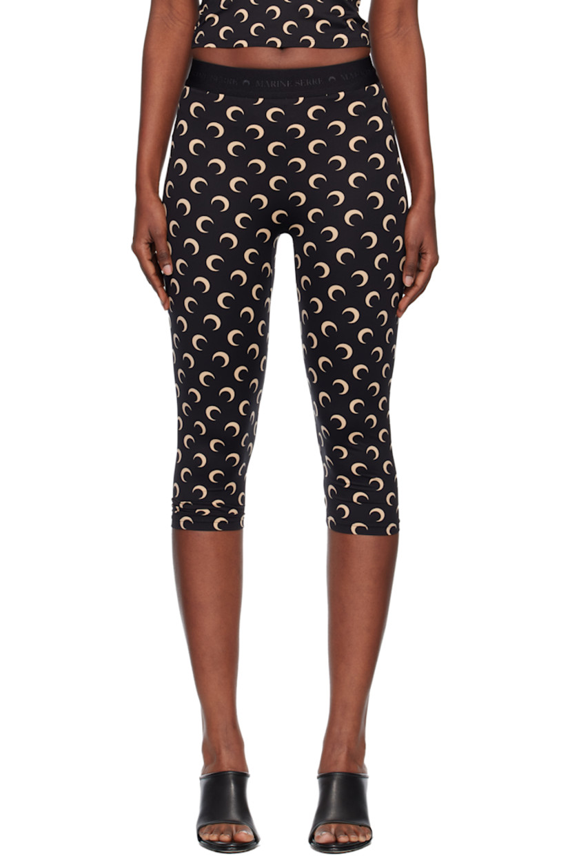 Stretch recycled nylon jersey leggings.

· Logo pattern printed throughout
· Logo-woven elasticized waistband

Supplier color: Moon tan on black