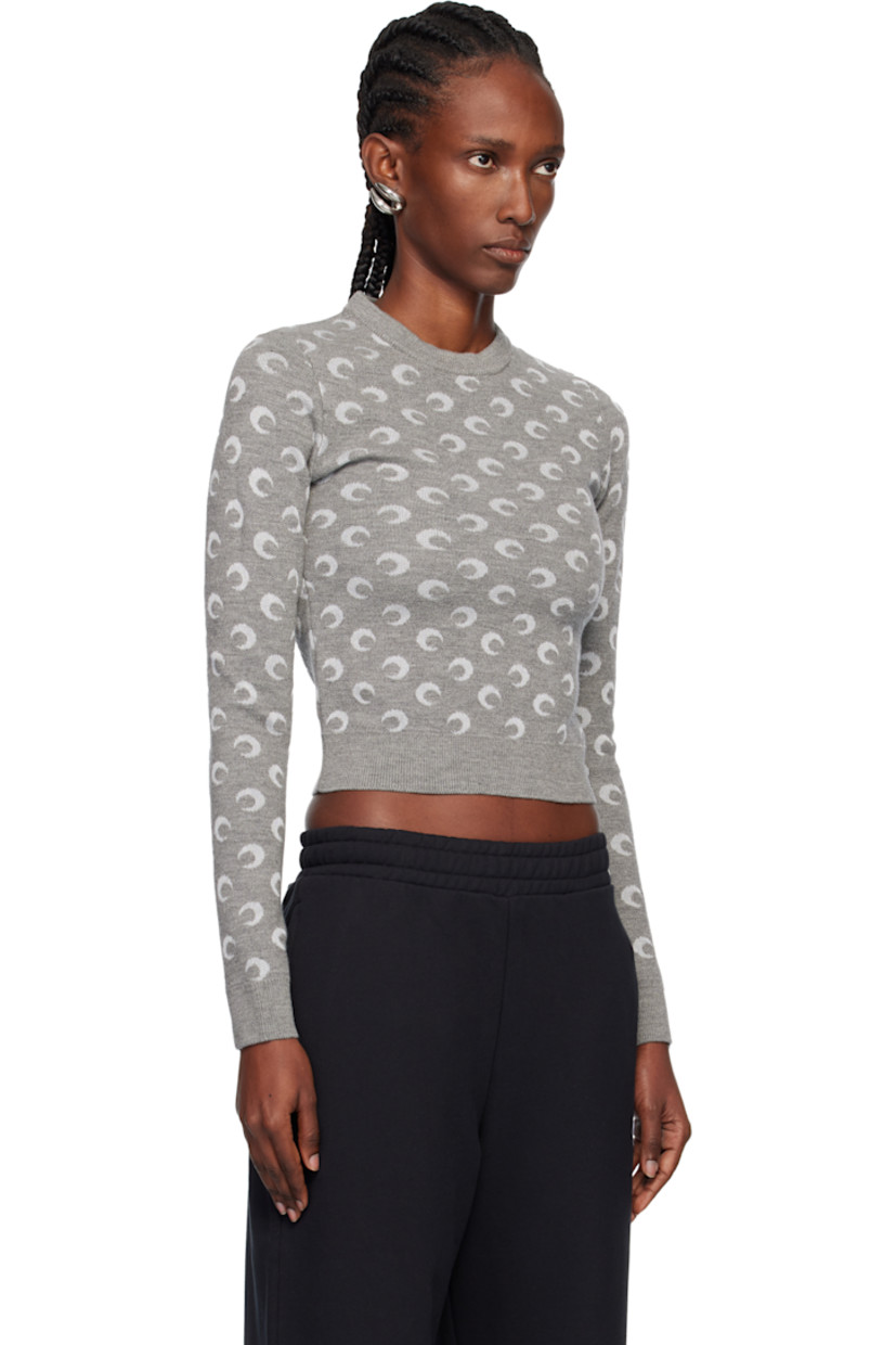 Knit virgin wool-blend sweater.

· Jacquard logo pattern throughout
· Rib-knit crewneck, hem, and cuffs
· Cropped hem

Supplier color: Misty grey