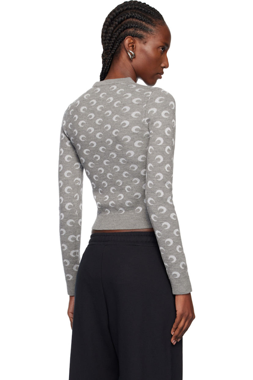 Knit virgin wool-blend sweater.

· Jacquard logo pattern throughout
· Rib-knit crewneck, hem, and cuffs
· Cropped hem

Supplier color: Misty grey