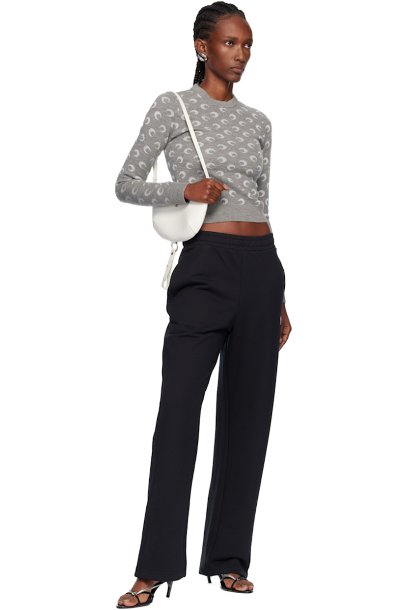 Knit virgin wool-blend sweater.

· Jacquard logo pattern throughout
· Rib-knit crewneck, hem, and cuffs
· Cropped hem

Supplier color: Misty grey