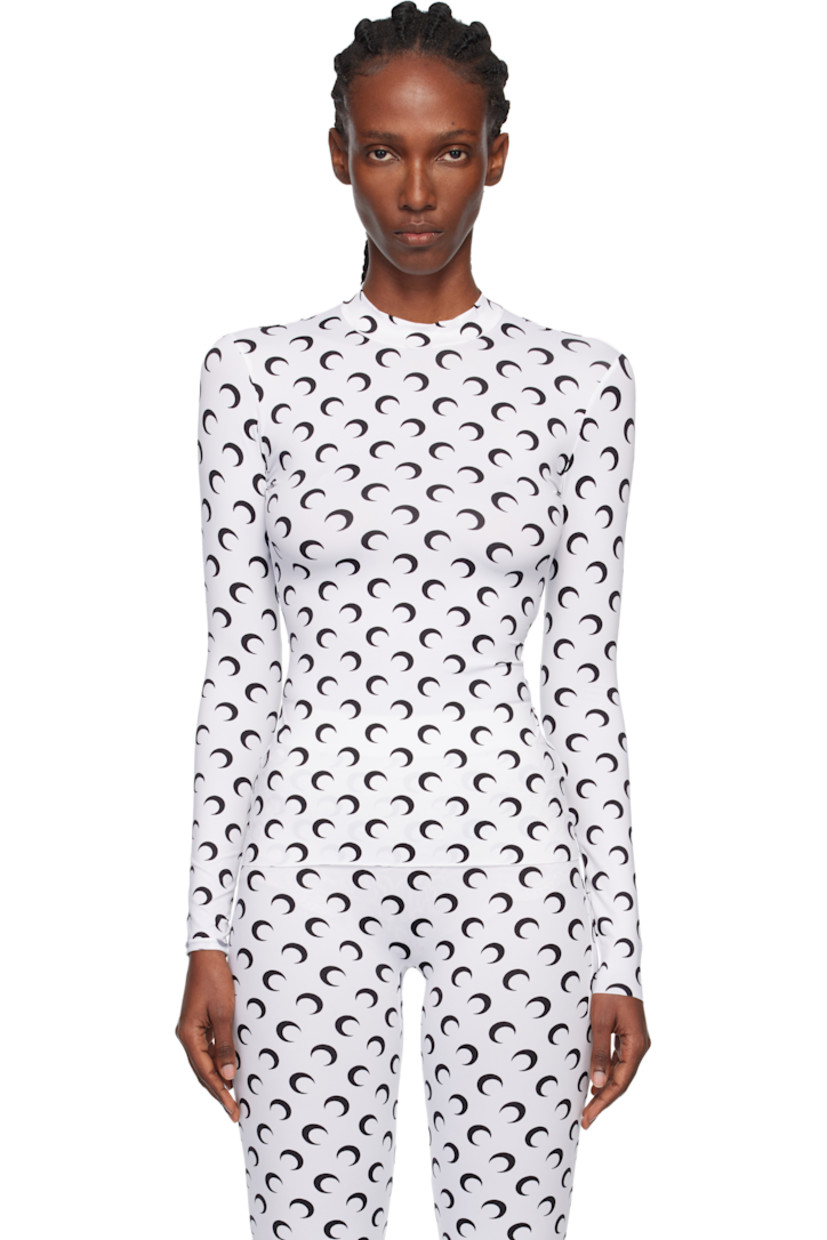 Stretch recycled nylon jersey top.

· Logo pattern printed throughout
· Mock neck
· Raw edge at hem and cuffs

Supplier color: Optical white