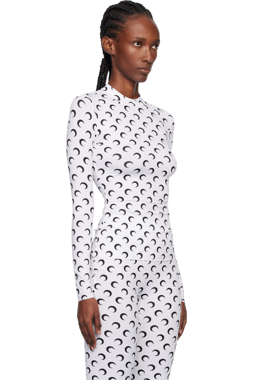 Stretch recycled nylon jersey top.

· Logo pattern printed throughout
· Mock neck
· Raw edge at hem and cuffs

Supplier color: Optical white