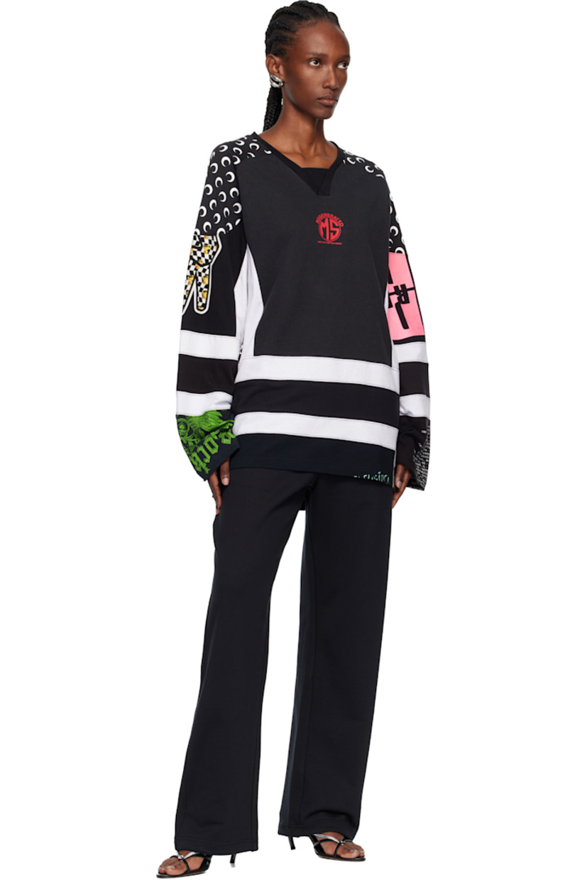 Upcycled cotton jersey T-shirt.

· Logo pattern and graphics printed throughout
· Paneled construction
· Rib-knit V-neck
· Logo printed at chest 
· Vented side seams
· Saddle shoulders

Each item is unique. Please note graphics may vary.

Supplier color: Black