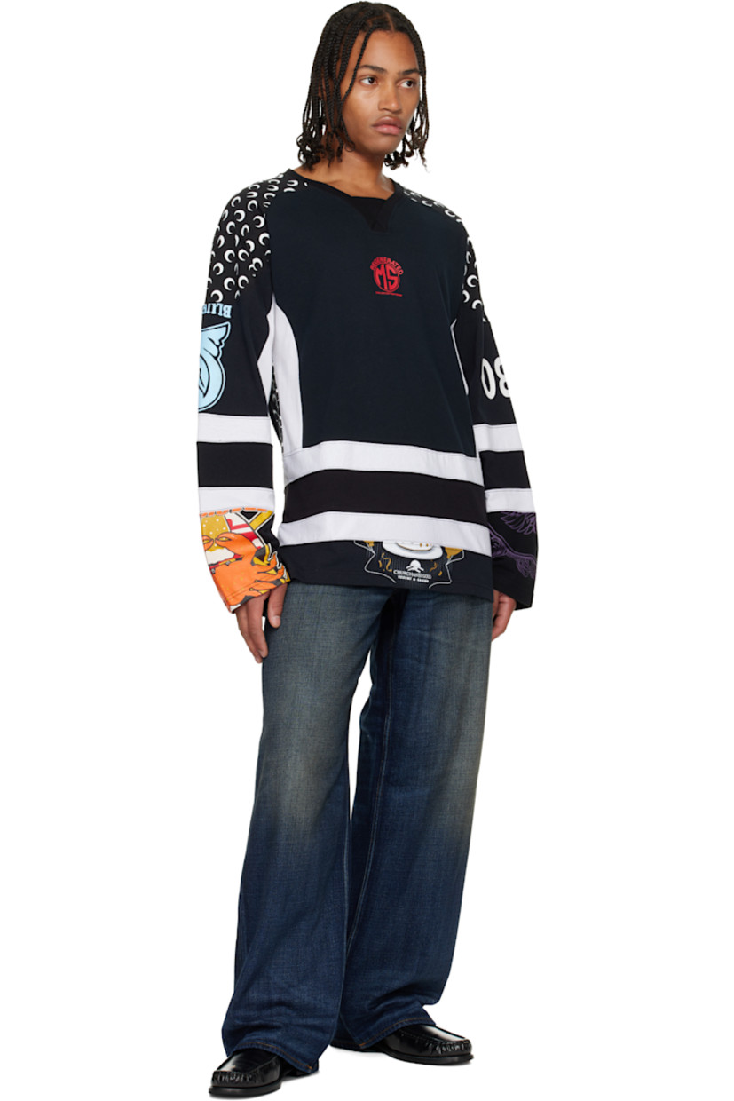 Upcycled cotton jersey T-shirt.

· Logo pattern and graphics printed throughout
· Paneled construction
· Rib-knit V-neck
· Logo printed at chest 
· Vented side seams
· Saddle shoulders

Each item is unique. Please note graphics may vary.

Supplier color: Regenerated graphic jersey black