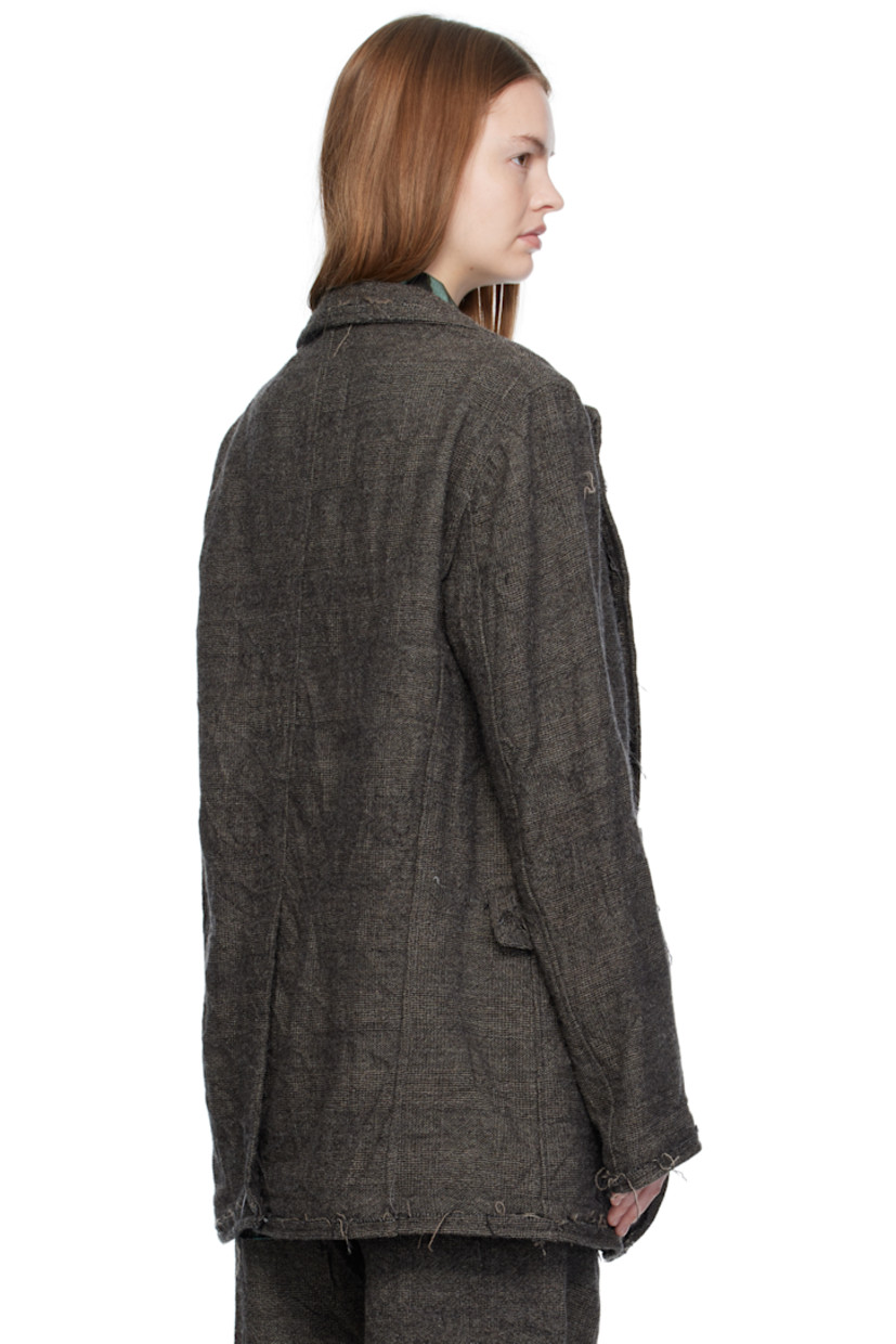 Wool tweed blazer.

· Check pattern and frayed edges throughout
· Notched lapel
· Button closure
· Welt pocket at chest
· Flap pockets at waist
· Central vent at back hem
· Unlined

Supplier color: Dark grey