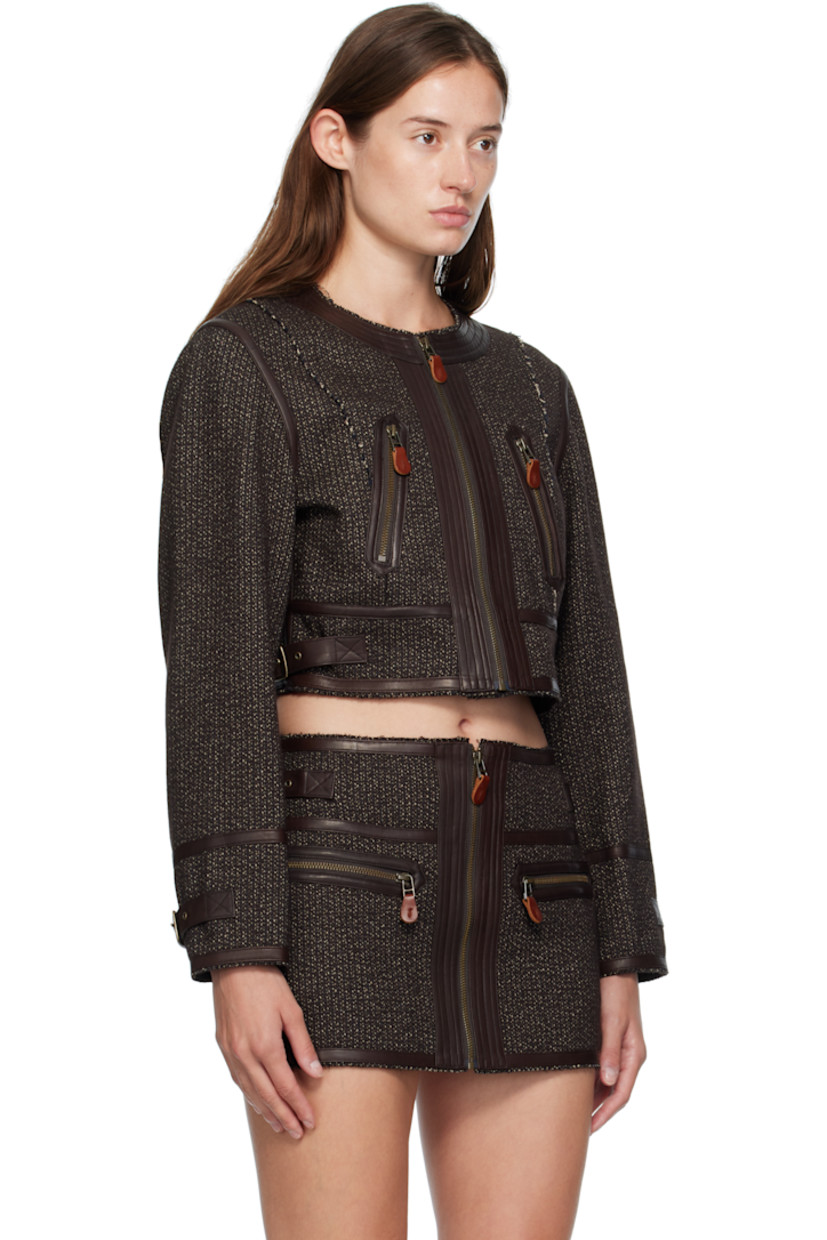 Brushed woven cotton- and wool-blend jacket.

· Buffed leather trim and raw edges throughout
· Round neck
· Zip closure
· Darts at front and back
· Zip pockets at waist
· Cropped hem
· Pin-buckle tab at side seams and cuffs
· Unlined
· Antiqued brass-tone hardware

Supplier color: Brown