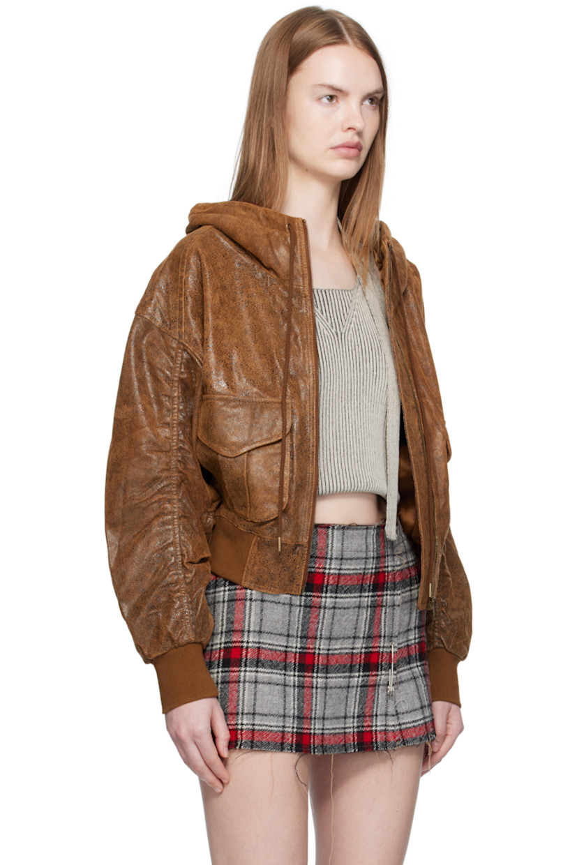 Cracked sheepskin jacket.

· Drawstring at hood
· Zip closure
· Bellows pockets at front
· Cropped hem
· Rib-knit hem and cuffs
· Dropped shoulders
· Ruching at sleeves and back
· Gathering at back hem
· Full satin twill lining

Supplier color: Brown