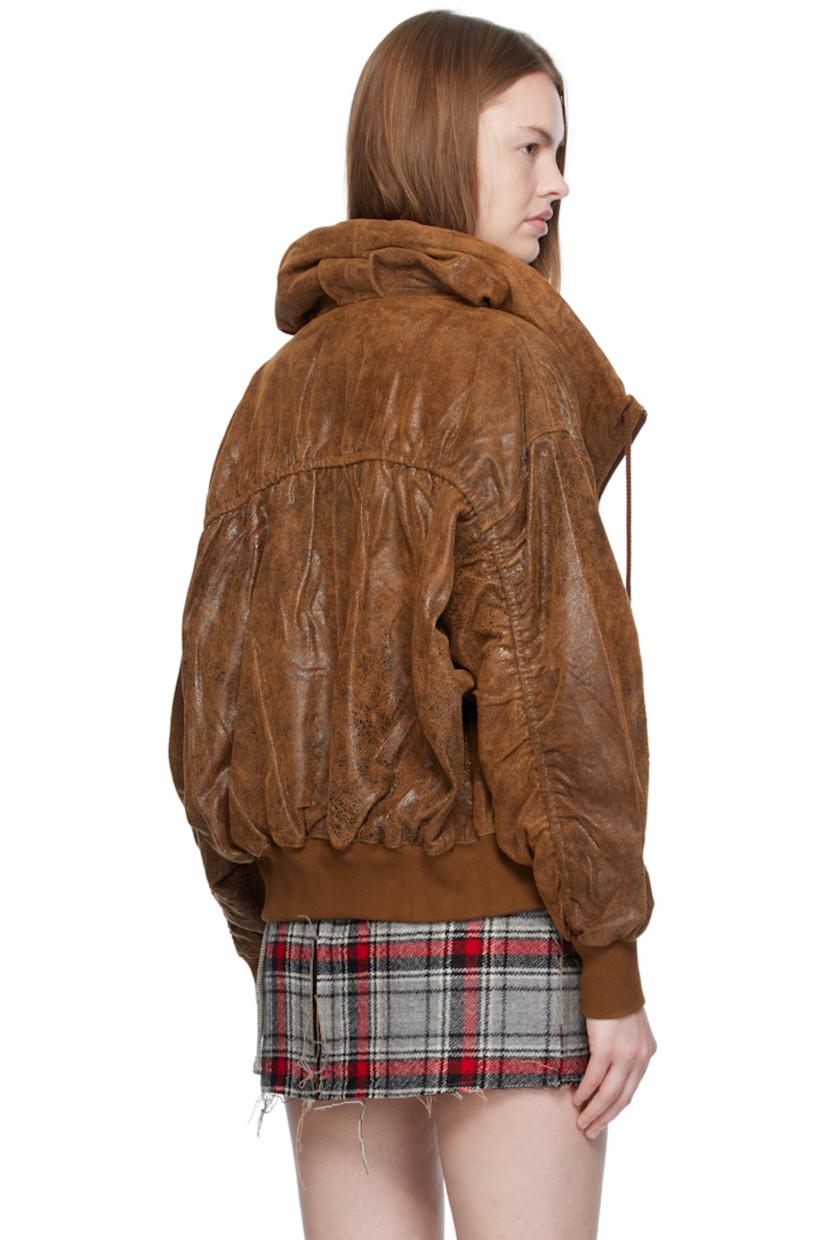 Cracked sheepskin jacket.

· Drawstring at hood
· Zip closure
· Bellows pockets at front
· Cropped hem
· Rib-knit hem and cuffs
· Dropped shoulders
· Ruching at sleeves and back
· Gathering at back hem
· Full satin twill lining

Supplier color: Brown