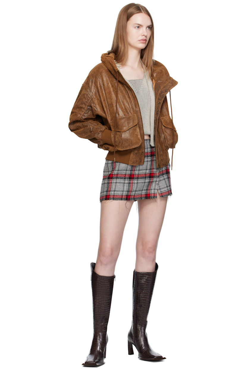 Cracked sheepskin jacket.

· Drawstring at hood
· Zip closure
· Bellows pockets at front
· Cropped hem
· Rib-knit hem and cuffs
· Dropped shoulders
· Ruching at sleeves and back
· Gathering at back hem
· Full satin twill lining

Supplier color: Brown