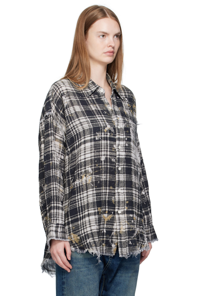 Cotton gauze shirt.

· Frayed edges, paint splatters, and check pattern throughout
· Spread collar
· Button closure
· Patch pocket at chest
· Shirttail hem
· Dropped shoulders
· Buttoned barrel cuffs

Supplier color: Black plaid/Splatter
