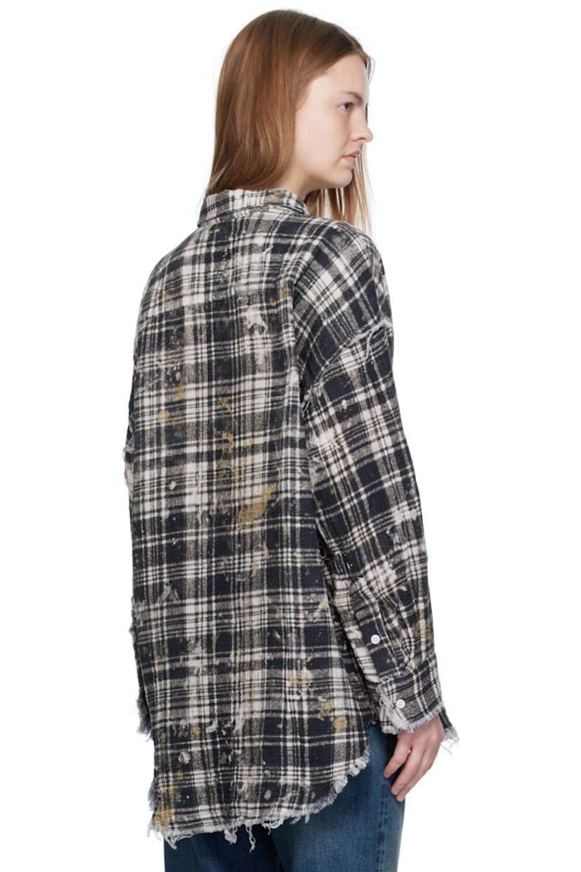 Cotton gauze shirt.

· Frayed edges, paint splatters, and check pattern throughout
· Spread collar
· Button closure
· Patch pocket at chest
· Shirttail hem
· Dropped shoulders
· Buttoned barrel cuffs

Supplier color: Black plaid/Splatter