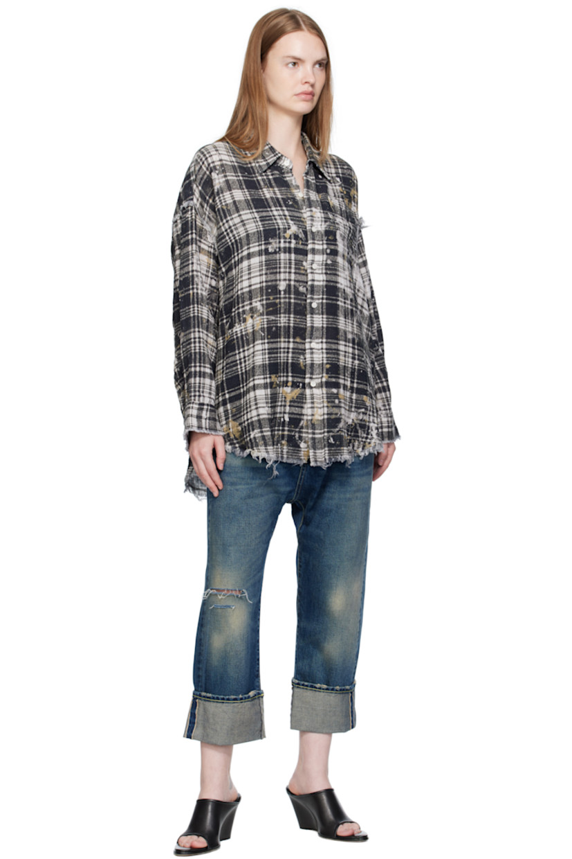 Cotton gauze shirt.

· Frayed edges, paint splatters, and check pattern throughout
· Spread collar
· Button closure
· Patch pocket at chest
· Shirttail hem
· Dropped shoulders
· Buttoned barrel cuffs

Supplier color: Black plaid/Splatter