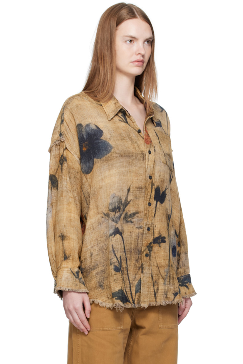 Reversible cotton gauze shirt. Frayed edges and printed floral pattern throughout

Reverse in brown cotton gauze. Check pattern throughout.

· Spread collar
· Button closure
· Patch pocket at chest and interior
· Shirttail hem
· Dropped shoulders
· Buttoned barrel cuffs

Supplier color: Plaid/Khaki floral