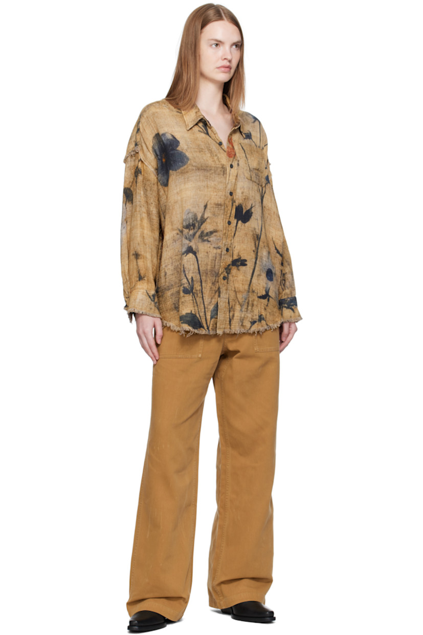 Reversible cotton gauze shirt. Frayed edges and printed floral pattern throughout

Reverse in brown cotton gauze. Check pattern throughout.

· Spread collar
· Button closure
· Patch pocket at chest and interior
· Shirttail hem
· Dropped shoulders
· Buttoned barrel cuffs

Supplier color: Plaid/Khaki floral