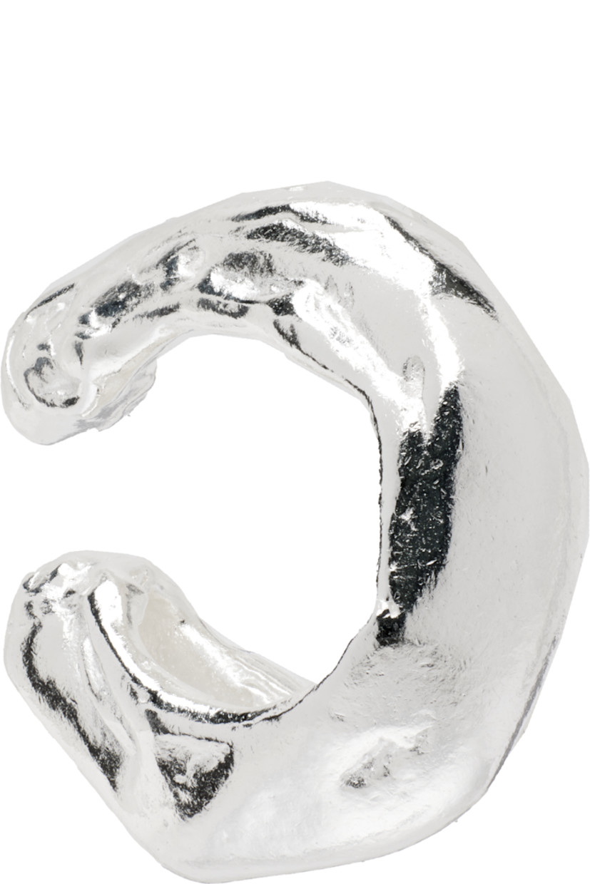 Single handcrafted ear cuff in recycled sterling silver.

· Textured detailing throughout
· D0.5"

Part of the El Fruto collection. 

Supplier color: Silver