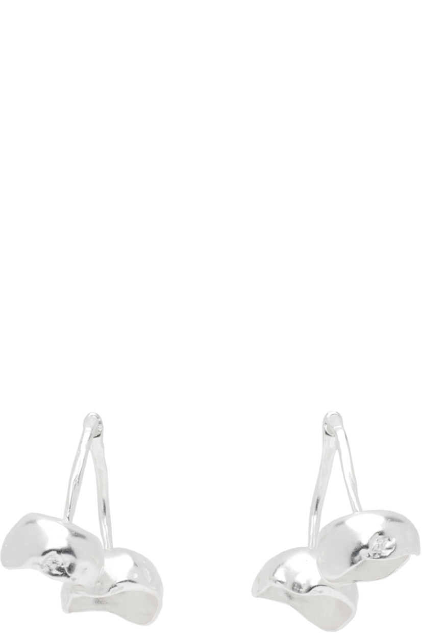 Pair of handcrafted drop earrings in recycled sterling silver. 

· Graphic at drop
· Post-stud fastening 
· H1.5" x W1.5"

Part of the El Fruto collection.

Supplier color: Silver