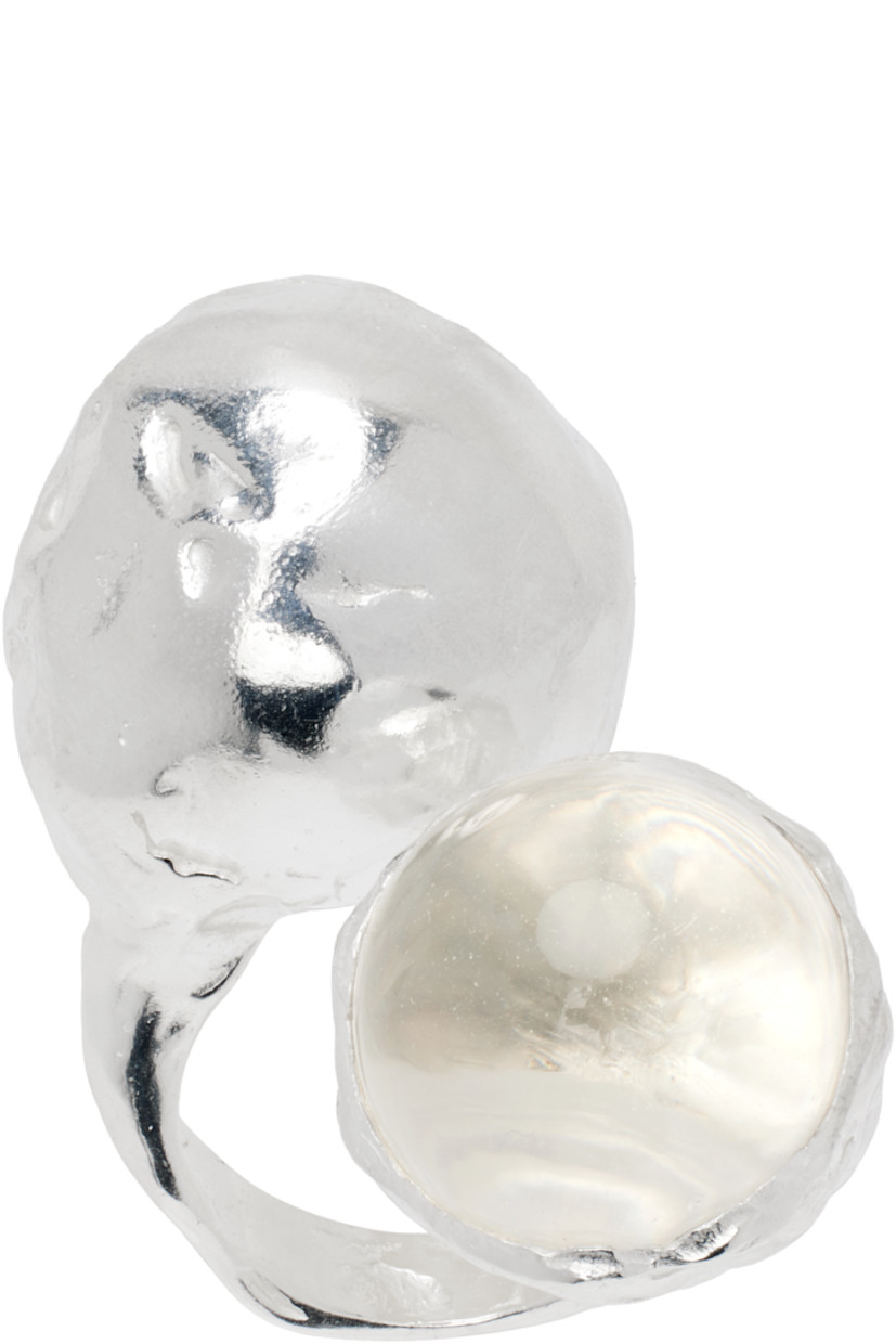 Handcrafted open band ring in recycled sterling silver. Bezel-set glass crystal at face.

Part of the El Fruto collection.

Supplier color: Silver/Clear