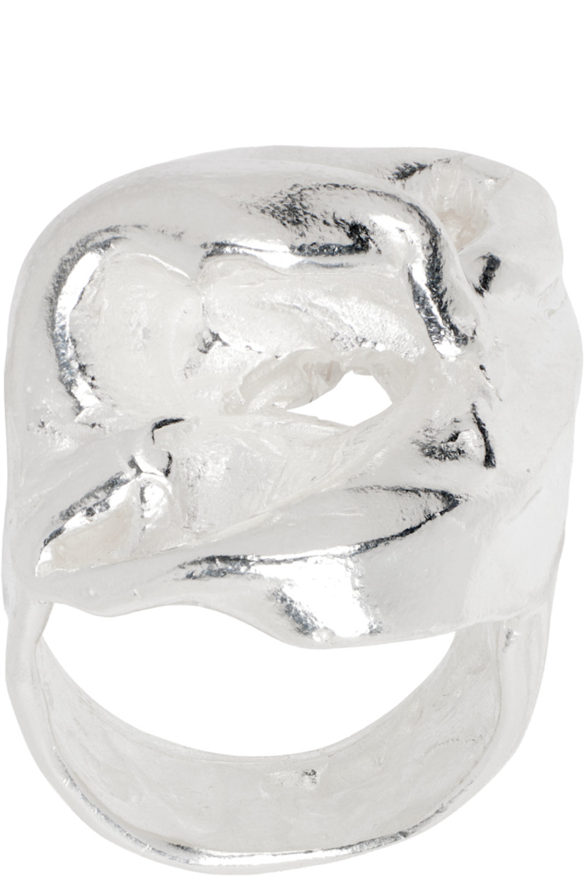 Handcrafted sculptural ring in recycled sterling silver. Cutouts at face.

Part of the Globo collection. 

Supplier color: Silver