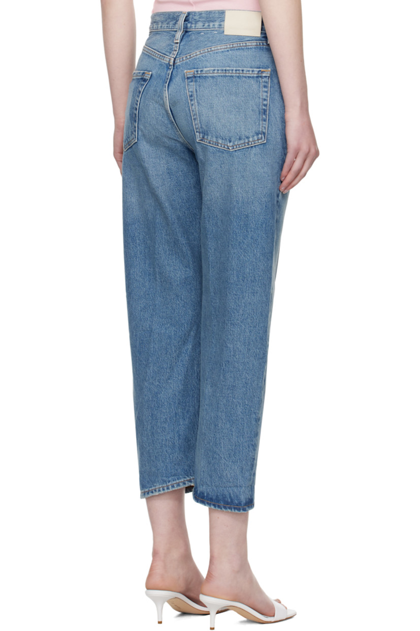 Non-stretch regenerative cotton denim jeans. Fading, whiskering, and subtle distressing throughout. 

· Loose-fit, tapered
· Belt loops
· Five-pocket styling
· Button fly
· Logo patch at back waistband
· Logo-engraved silver-tone hardware 
· Contrast stitching in tan 

Part of the HUMANITY collection.

Supplier color: Pacifica