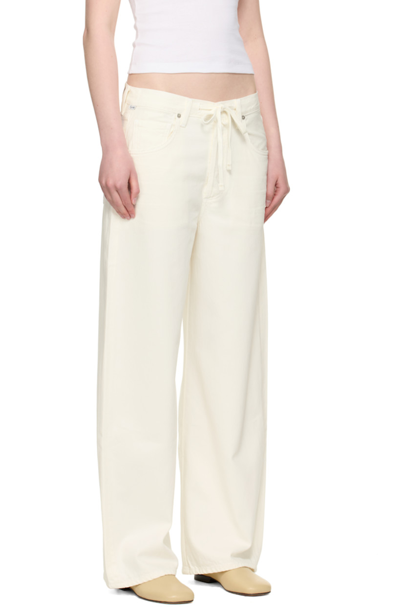 Non-stretch regenerative cotton denim jeans. Subtle distressing throughout. 

· Drawstring at waistband
· Belt loops
· Five-pocket styling
· Button fly 
· Logo patch at outseam 
· Leather logo patch at back waistband
· Logo-engraved silver-tone hardware

Supplier color: Pashmina