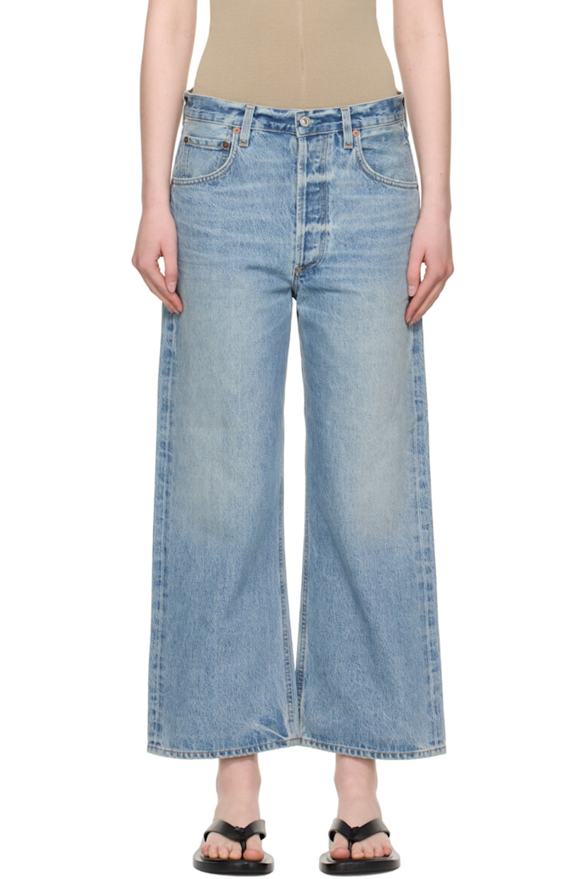 Non-stretch regenerative cotton denim jeans. Fading, whiskering, and subtle distressing throughout. 

· Wide-leg
· High-rise
· Belt loops
· Five-pocket styling
· Button fly 
· Cropped legs
· Logo patch at outseam 
· Leather logo patch at back waistband
· Logo-engraved silver- and bronze-tone hardware
· Contrast stitching in tan 

Part of the HUMANITY collection.

Supplier color: Sodapop