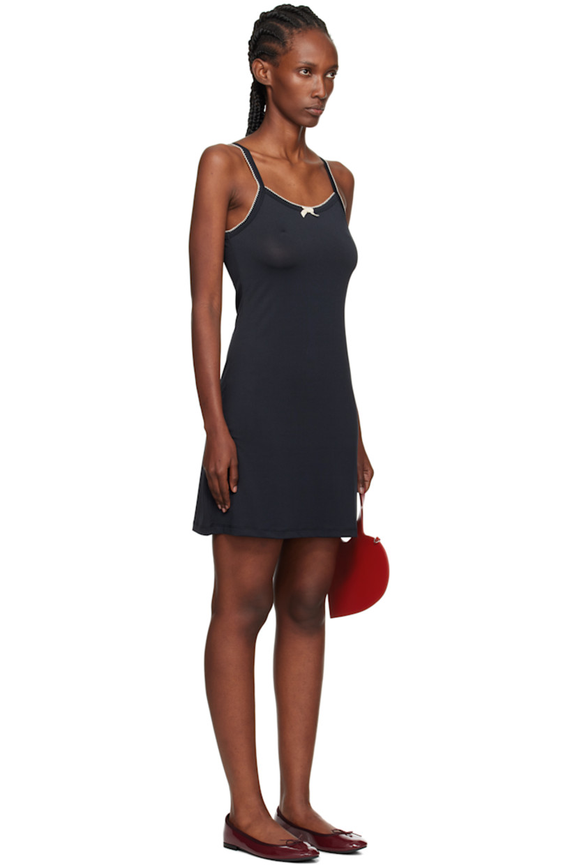 Stretch jersey minidress.

· Scoop neck 
· Velvet bow at chest
· Fixed shoulder straps
· Logo embroidered at back 
· Contrast stitching in white

Supplier color: Black
